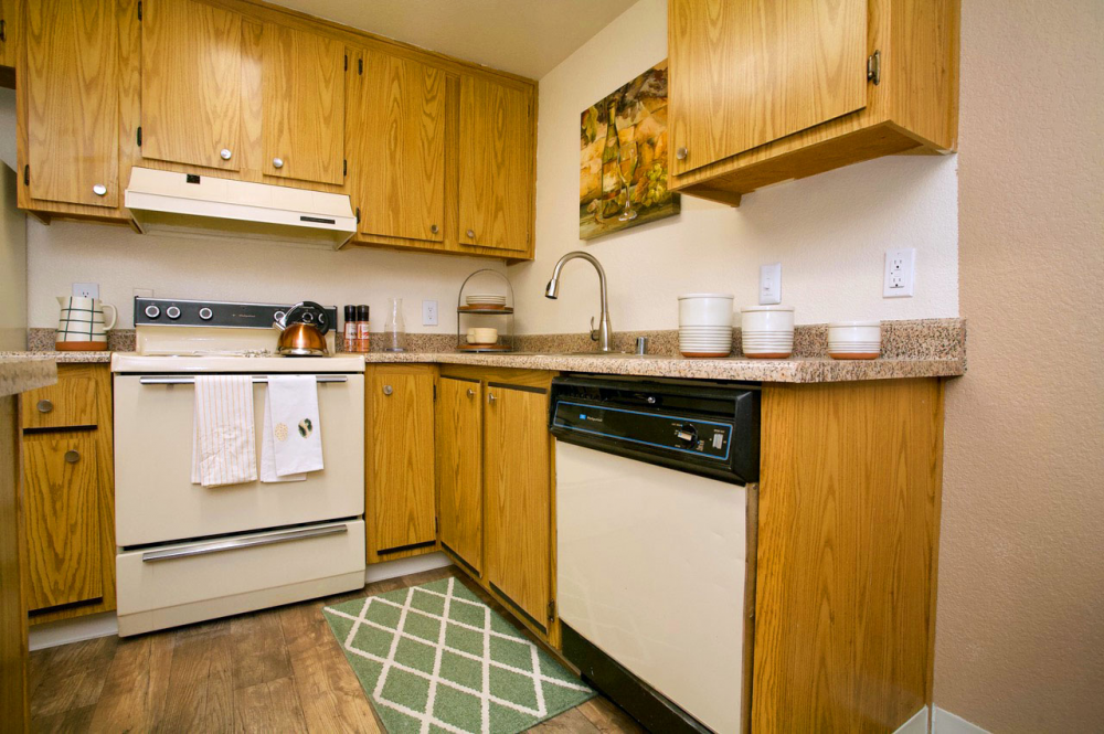 This image is the visual representation of Living, kitchen, dining 9 in Walnut Village Apartments.